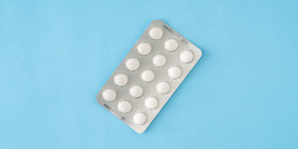 Pill blister Pack on blue background